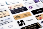 Other examples of printed & engraved name badge options available. Image 9